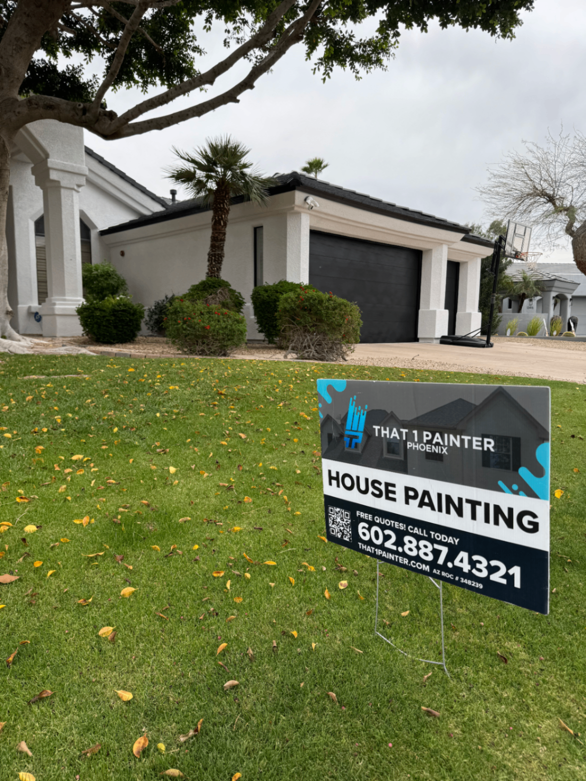 That 1 Painter Phoenix yard sign in front of a freshly painted home