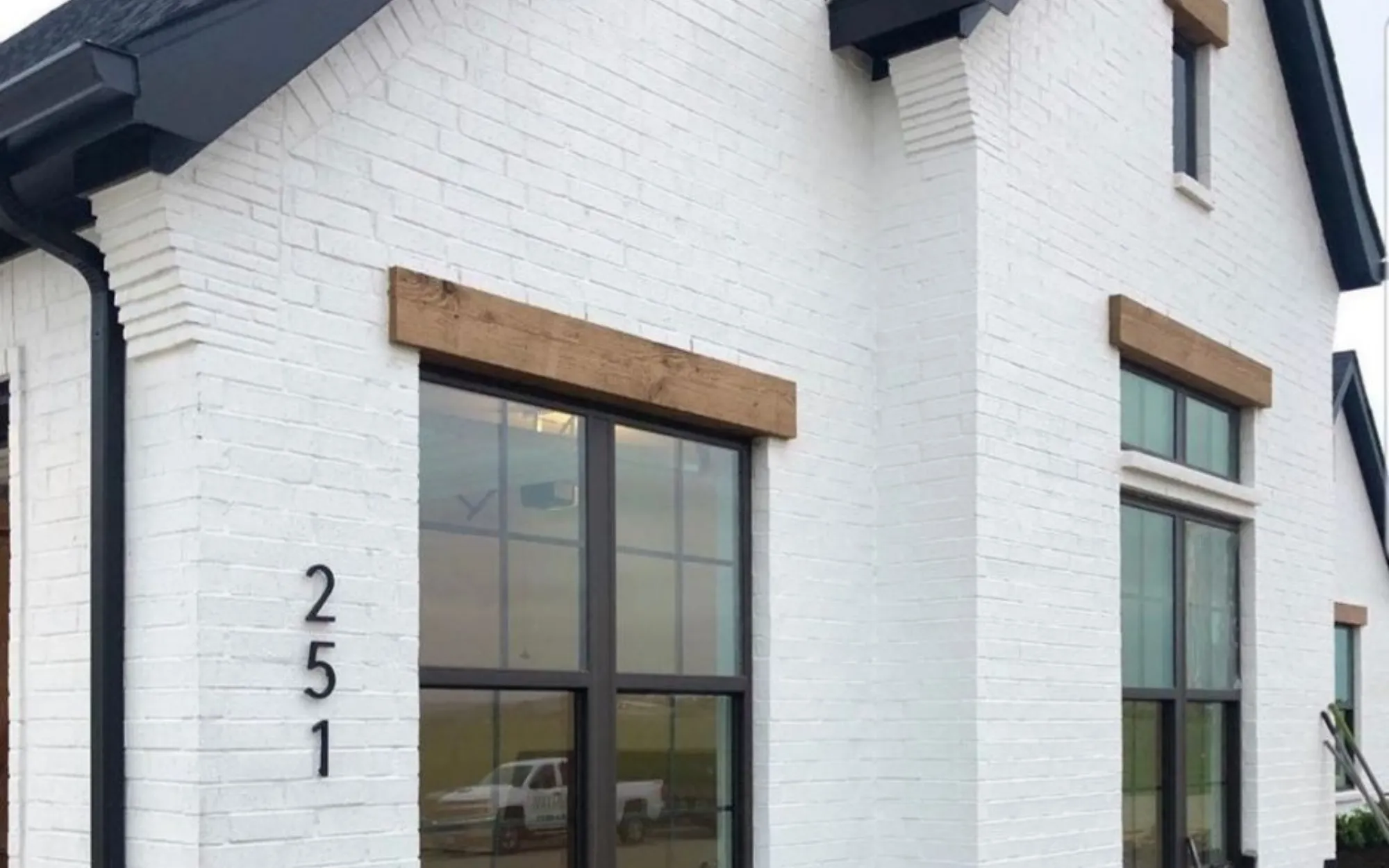 White painted brick exterior with modern farmhouse style in Bellaire, TX