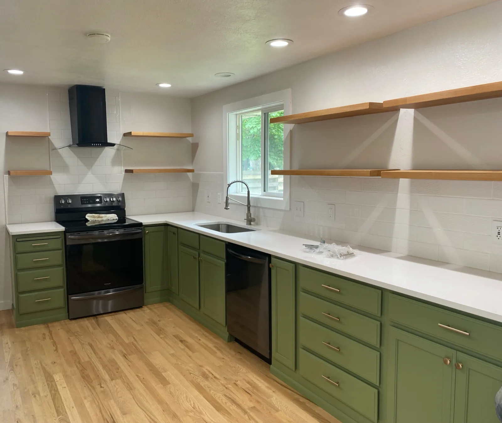 Boise kitchen with olive green lower cabinets, open wood shelving and white walls refinished by That 1 Painter Treasure Valley
