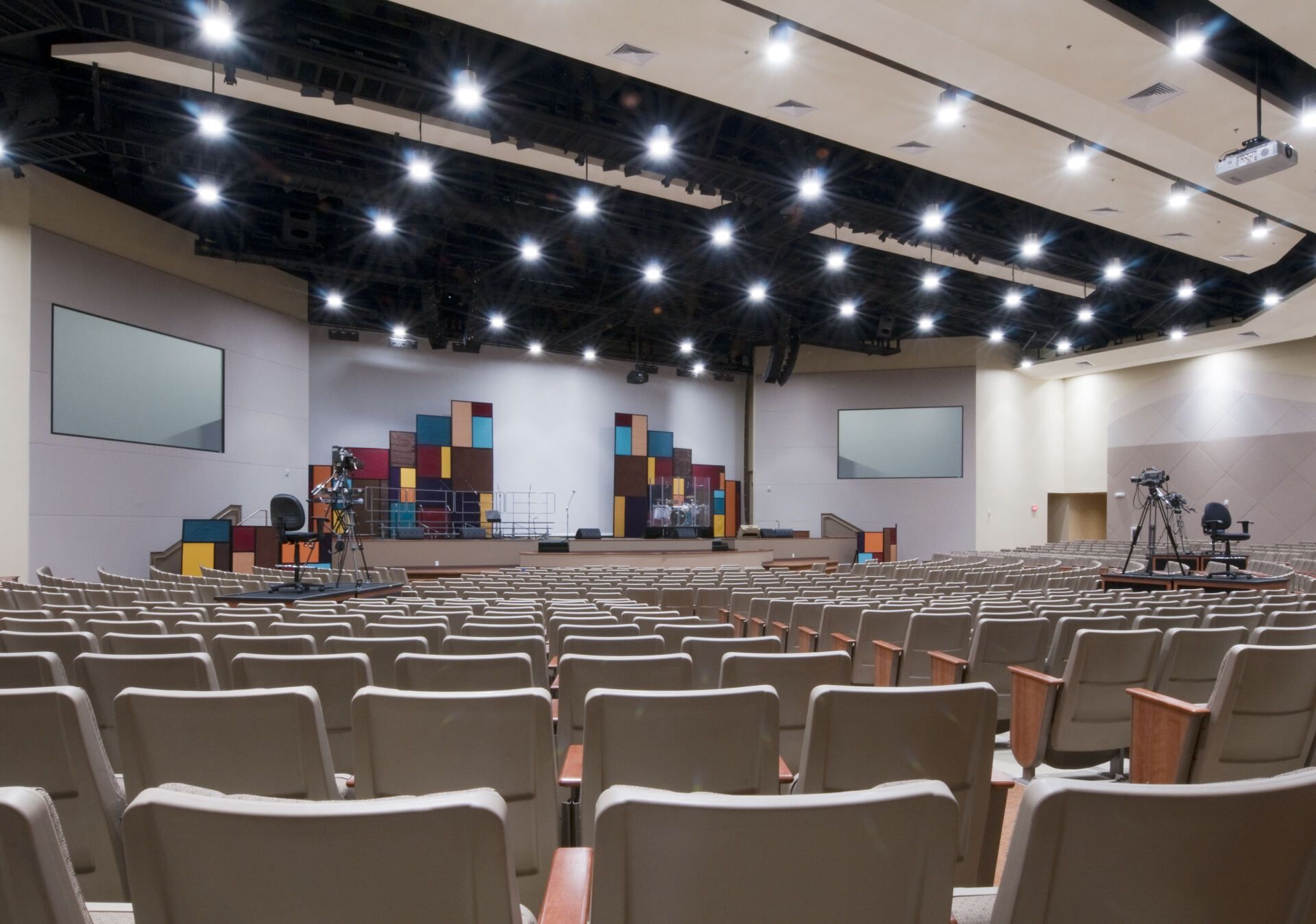 Freshly painted church sanctuary interior with vaulted ceiling