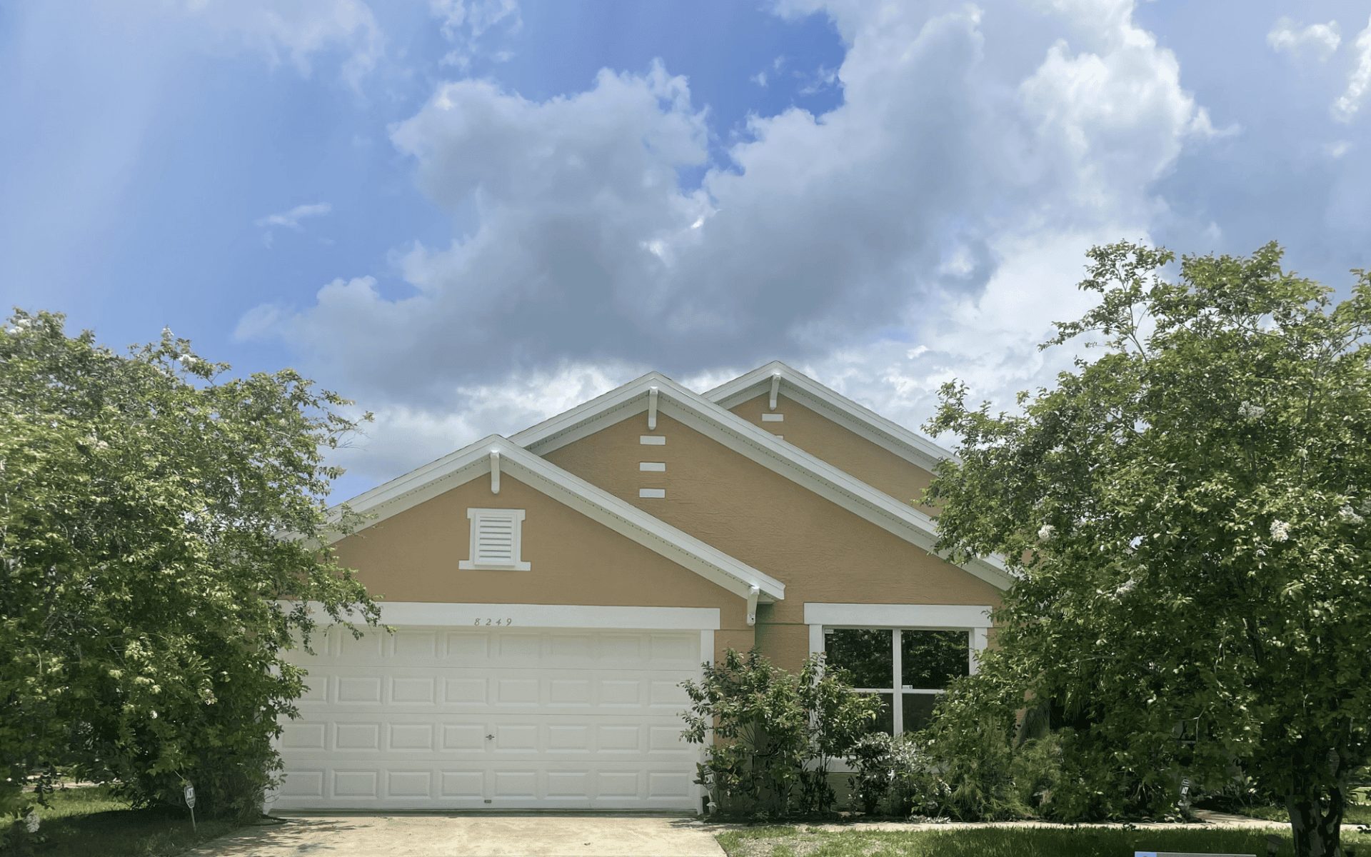 Professional stucco exterior painting project in Tampa Bay by That 1 Painter