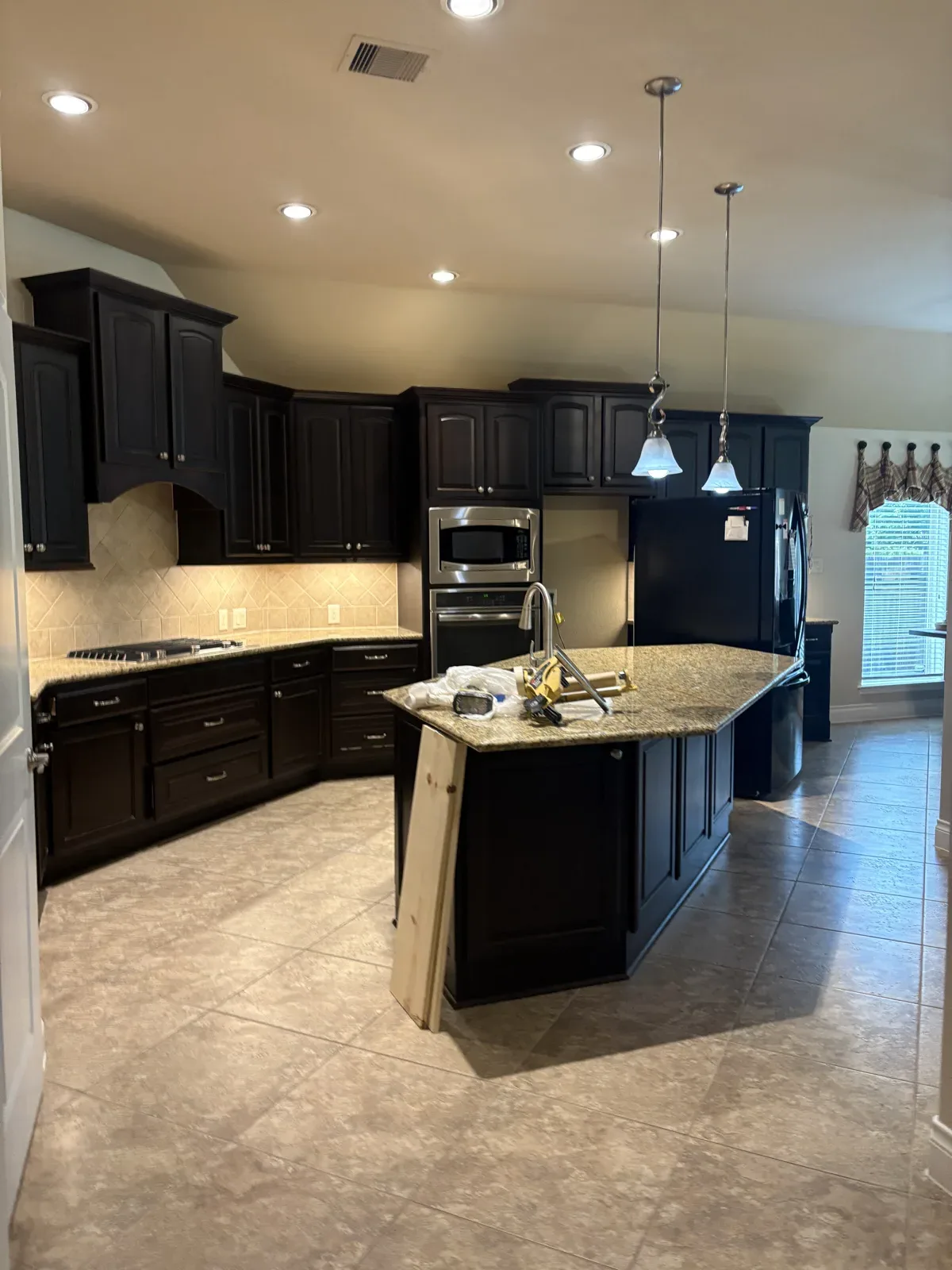 Professional cabinet & interior painting project in Fort Bend County by That 1 Painter