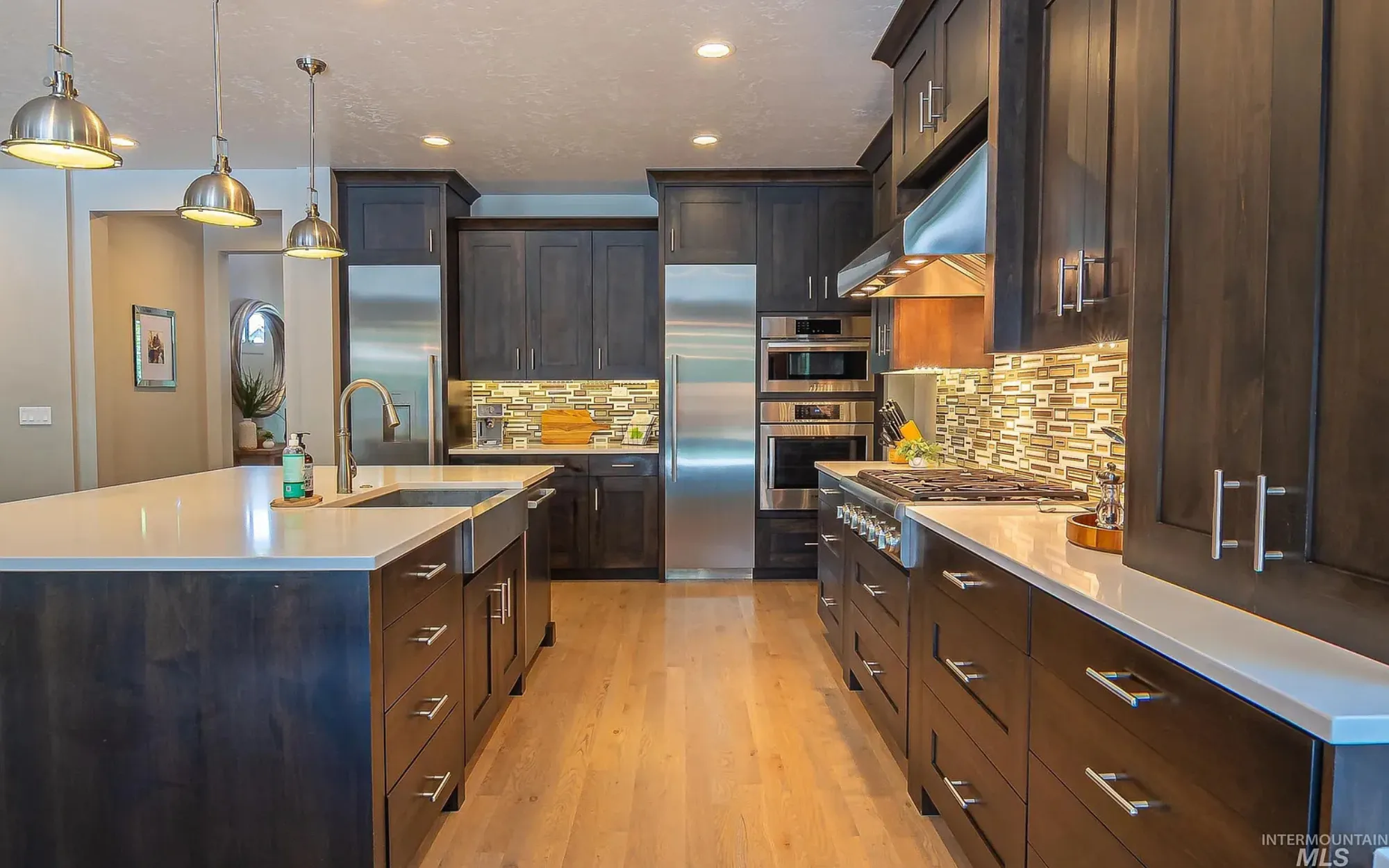 Dark cabinet refinish and interior painting in a Biltmore Scottsdale kitchen by That 1 Painter
