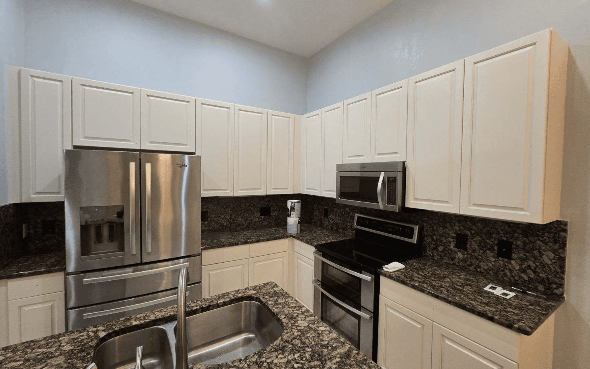 Professional cabinet and kitchen painting project in Tampa Bay by That 1 Painter