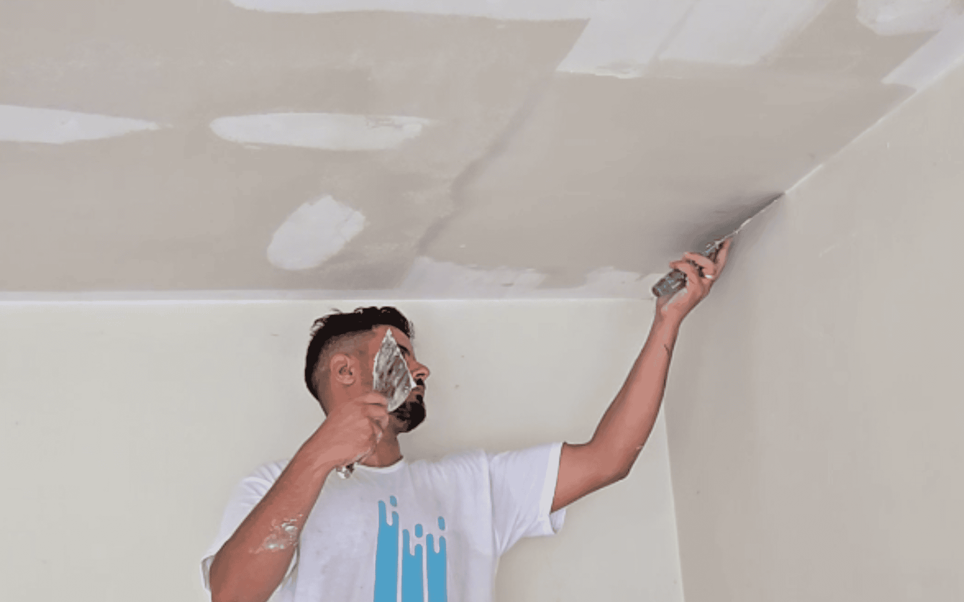 Smoothing ceiling after popcorn removal in Bellaire home
