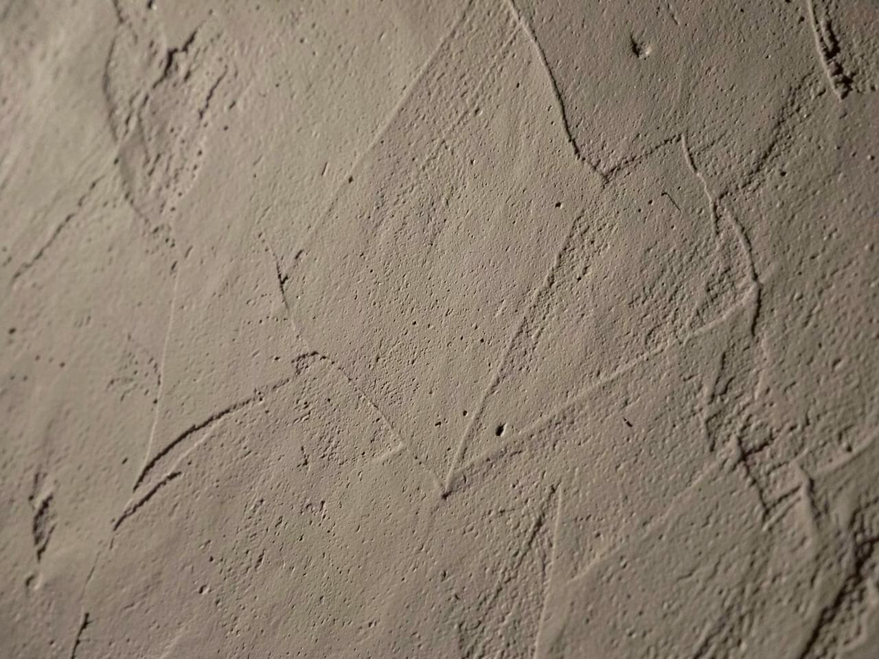 Close up of troweled Roman clay plaster texture in raking light