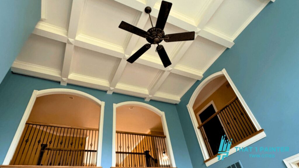 Tall white ceiling with blue walls part of interior painting project in the winter in Minneapolis