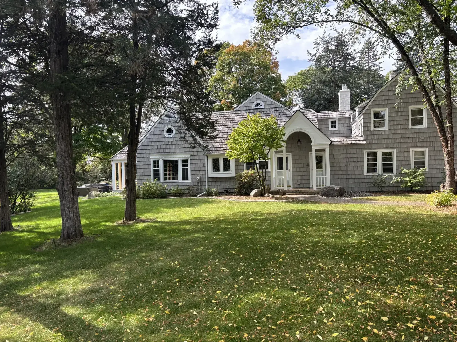 Cedar shingle exterior painting on a Twin Cities home by That 1 Painter