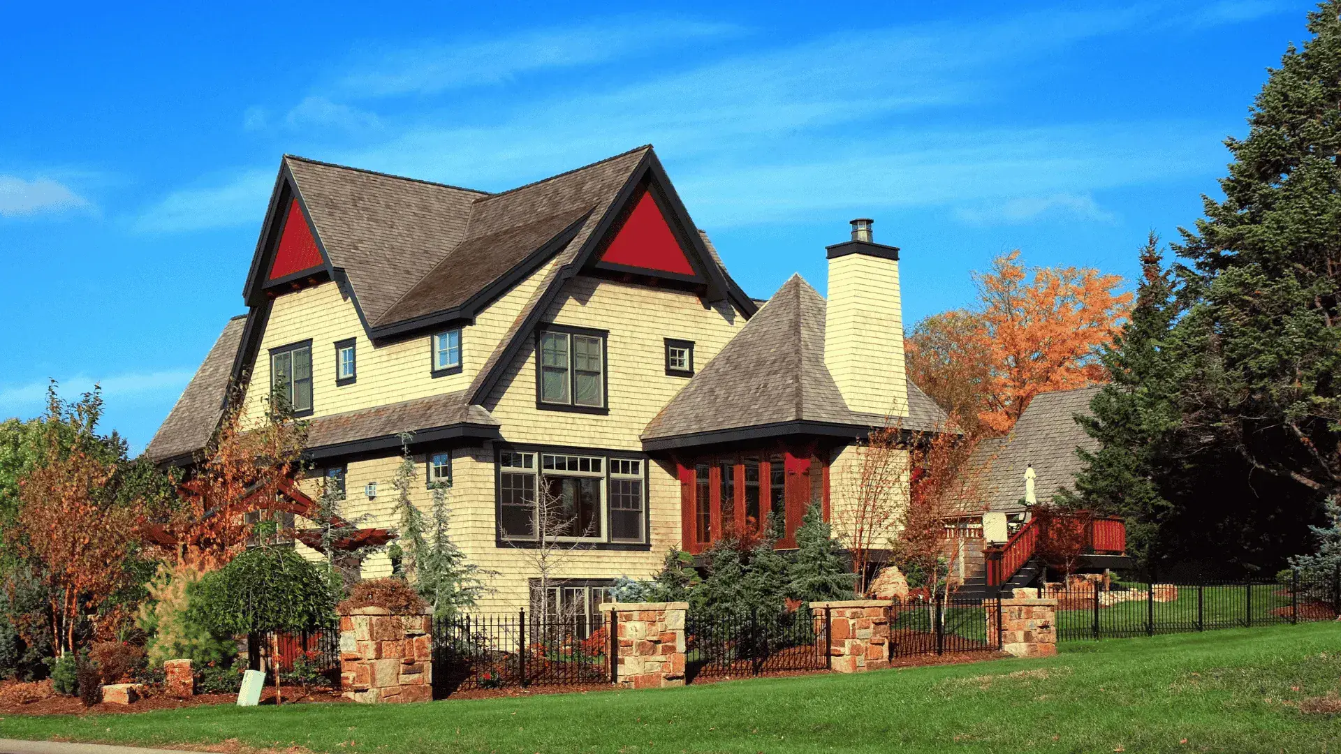 Professional exterior repaint of a shingle-style Twin Cities home by That 1 Painter