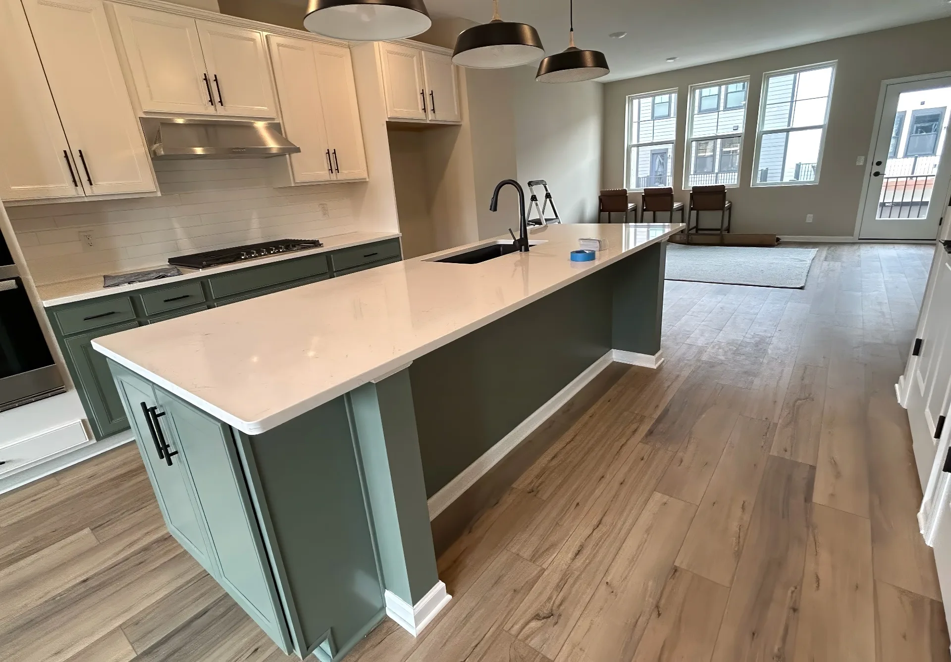 Two-tone cabinet and interior painting in a Twin Cities kitchen by That 1 Painter