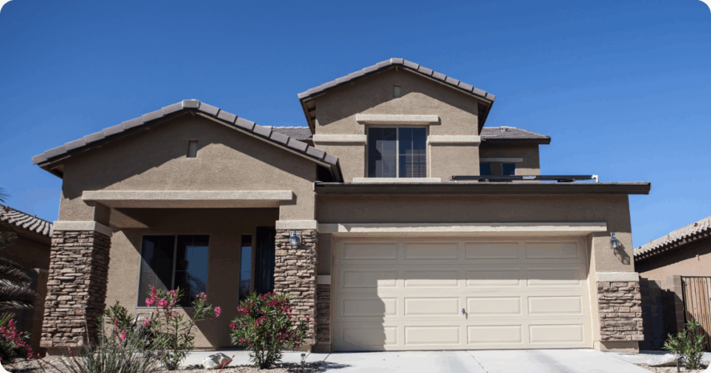 stucco repair in austin-beige home with white trim painted and repaired stucco done by that 1 painter