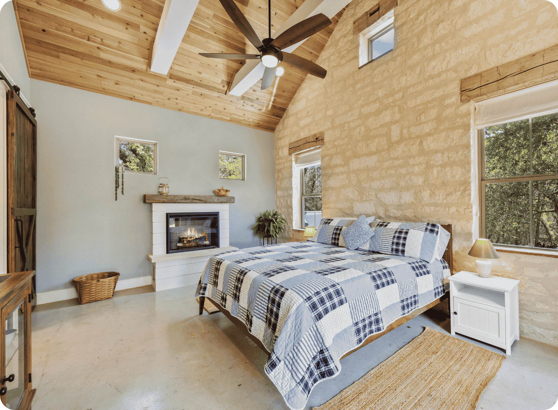 professional painter painted bedroom with rockwall and wood ceiling for interior painting