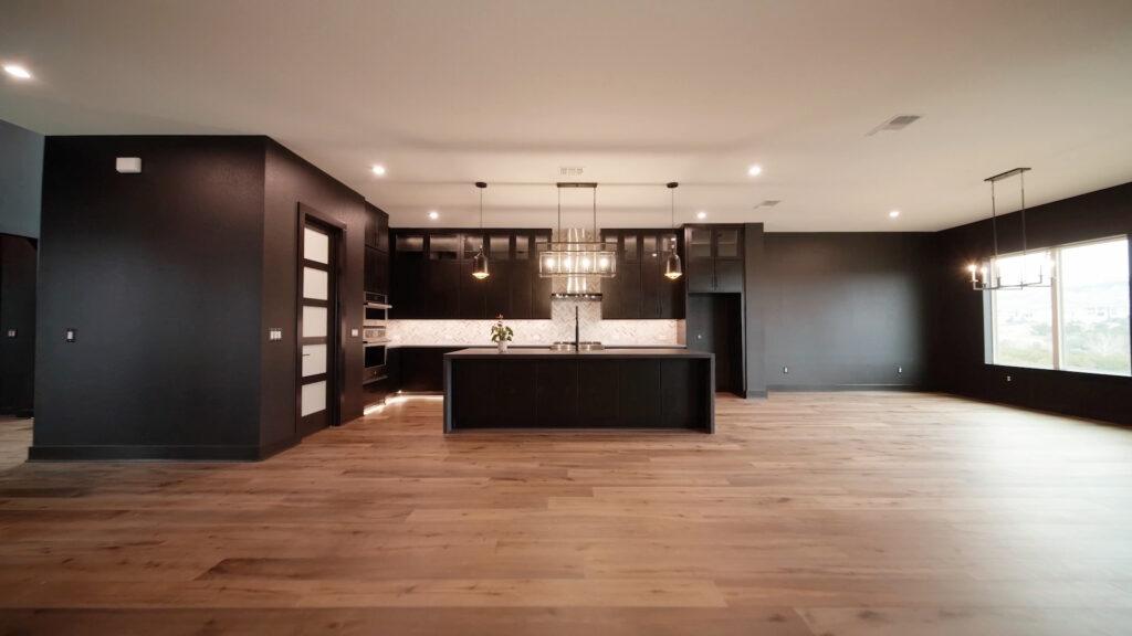 Interior of house with black cabinets professionally painted to transform kitchen by that 1 painter cincinnati