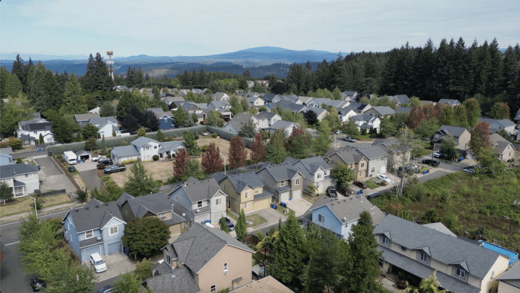 A bird's eye view of a neighborhood in Eugene that used the exterior painting services of That 1 Painter Eugene.