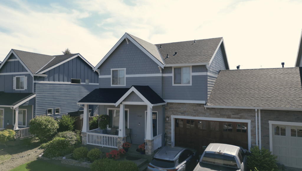 The exterior of a home that was painted a gray by That 1 Painter Eugene.