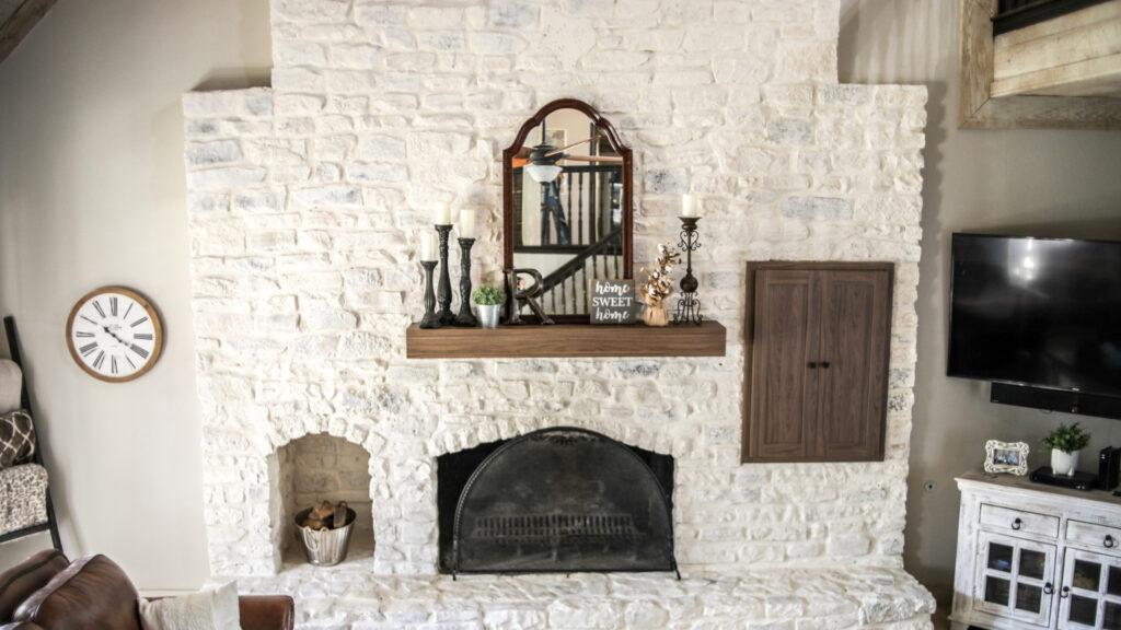 A completed limewash project on a fireplace on the inside of a home_that 1 painter Fairfax Mclean