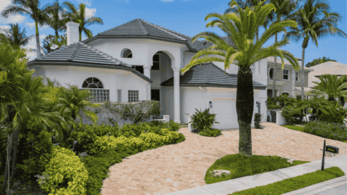 Beautiful white exterior of the house painted by professional painters in Newberry, Florida