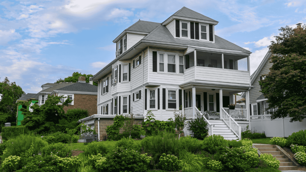 Large home with white exterior painted by That 1 Painter Greater Boston for high end owners who invest in good paint jobs