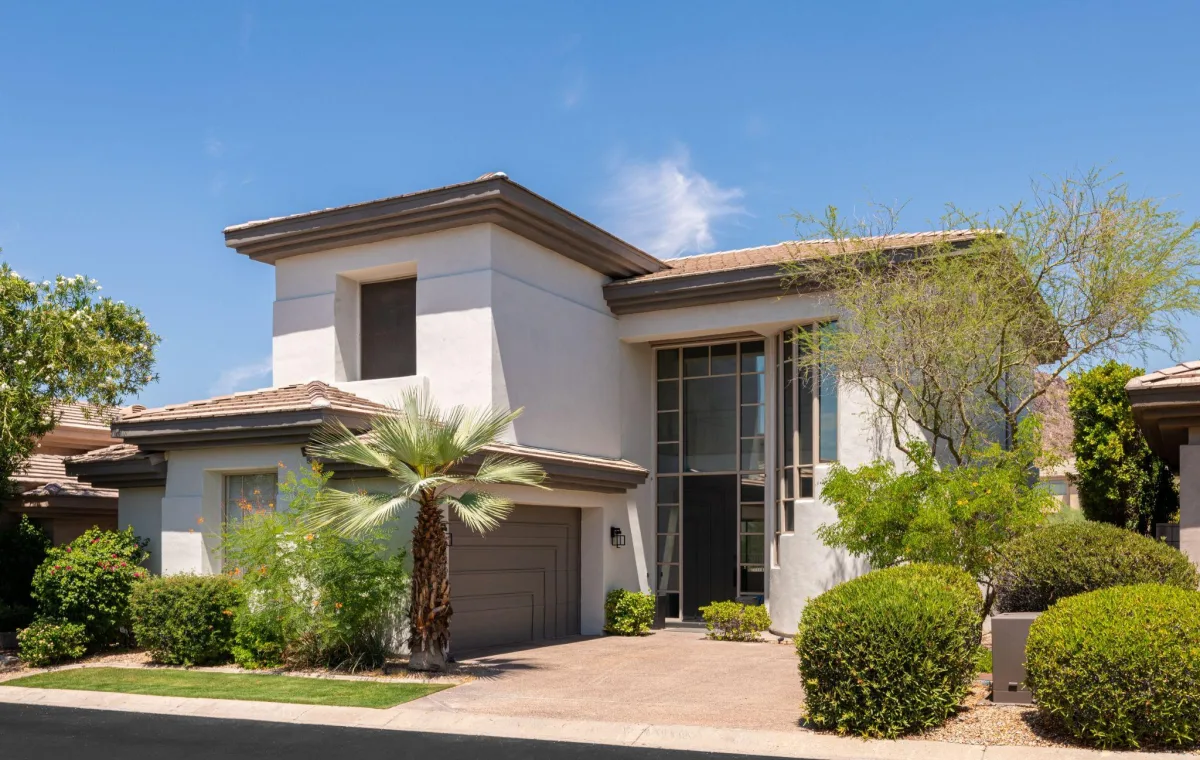 Stucco home exterior in a dry sunny climate