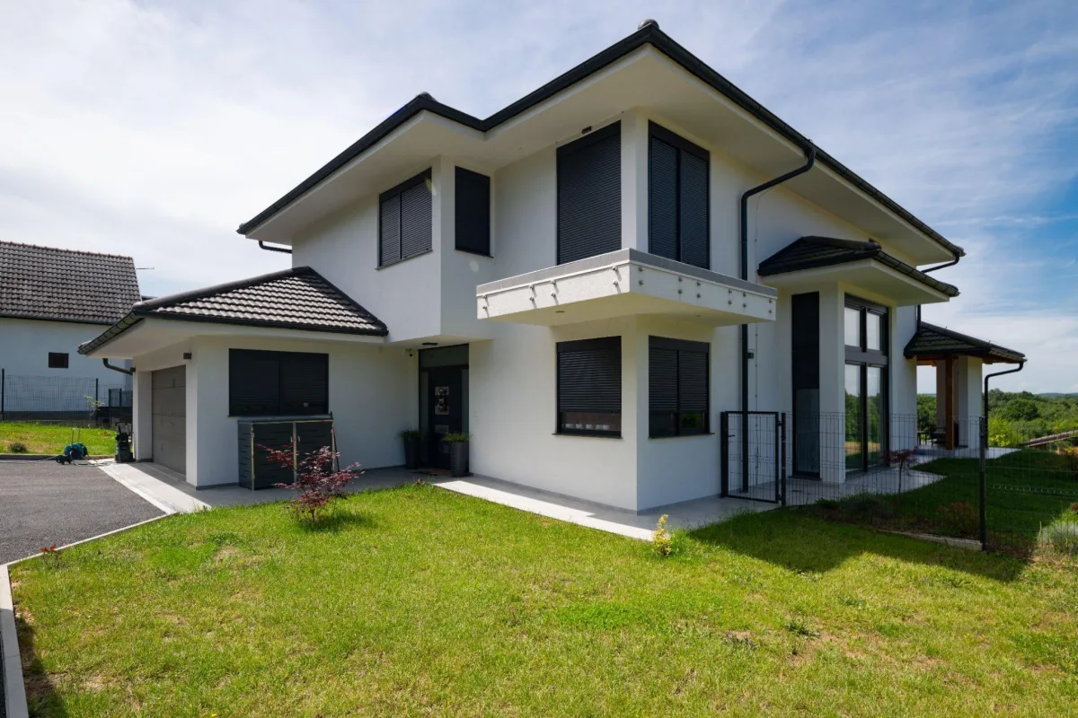 Exterior of a modern home with clean siding and trim