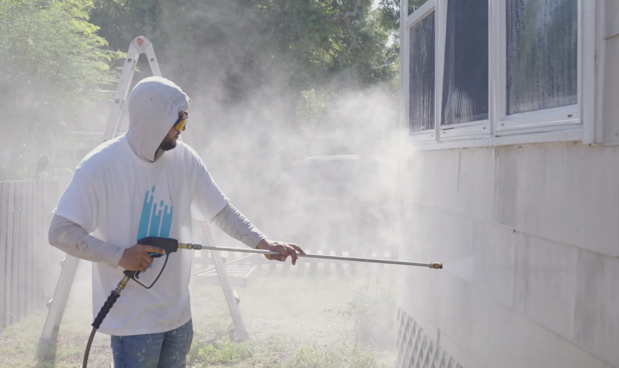 Pressure washing mildew and grime from home siding in St. Petersburg, FL