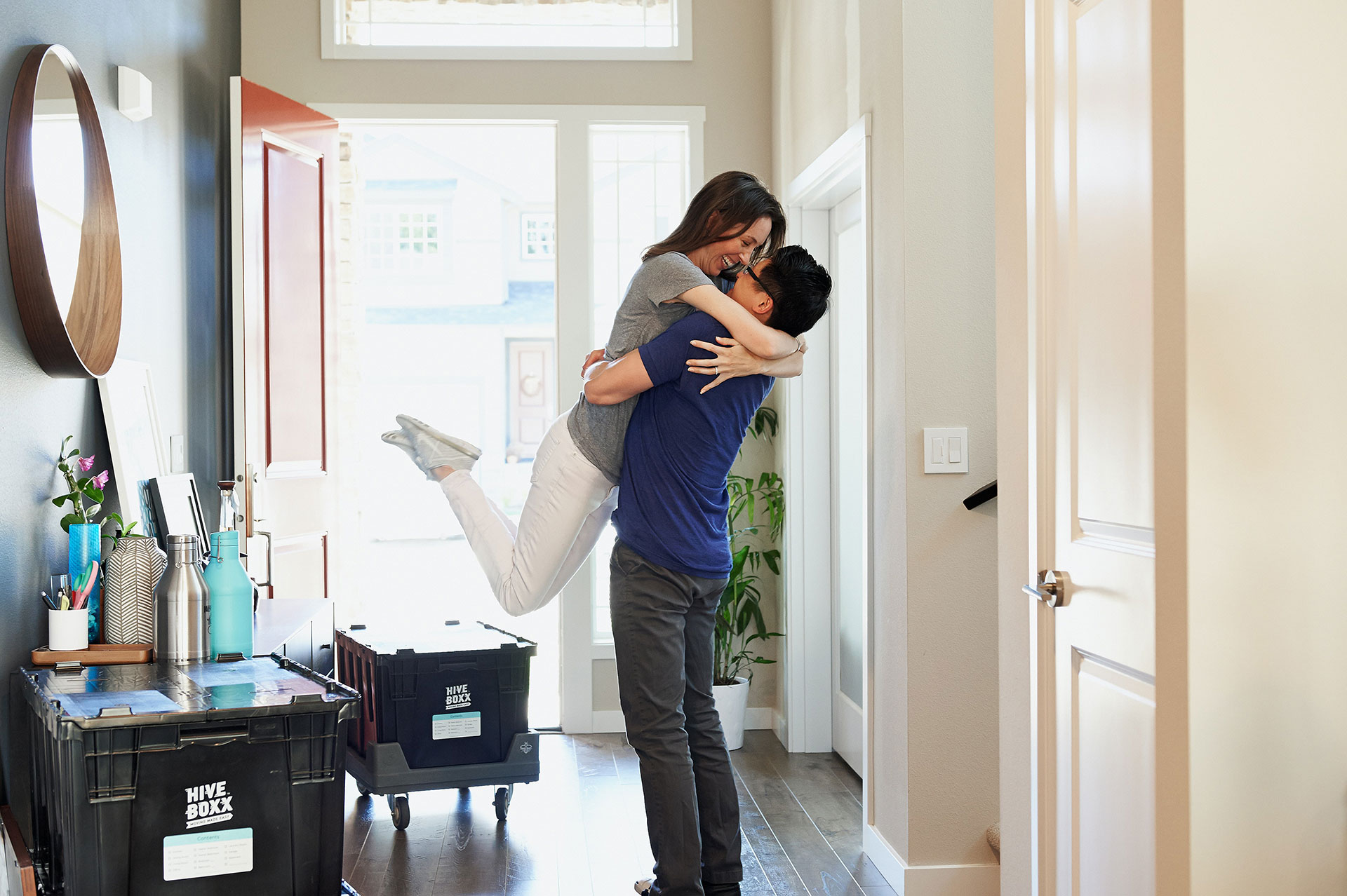 A couple that is embracing after a great interior painting job by That 1 Painter Knoxville