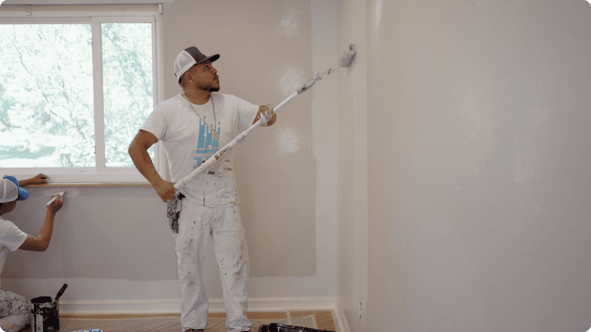 Professional painters painting the inside of a Knoxville home white - That 1 Painter Knoxville