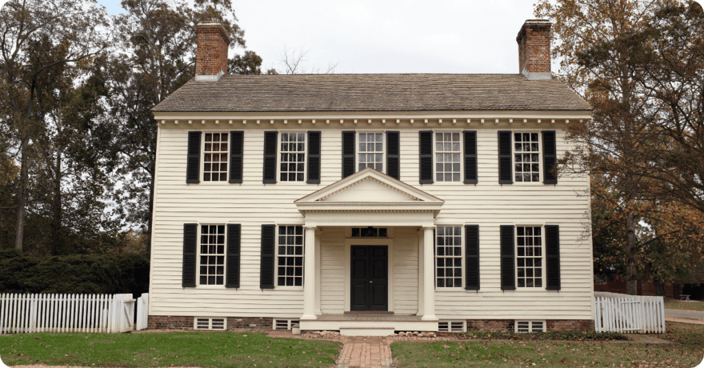white colonial home with columns and white exterior paint for that 1 painter lake lanier