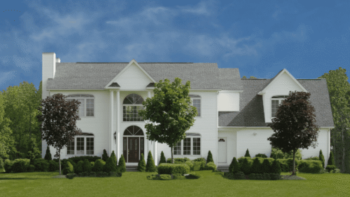 Beautiful house with white exteriors and dark trim painted by professional painters in Middleburg, VA