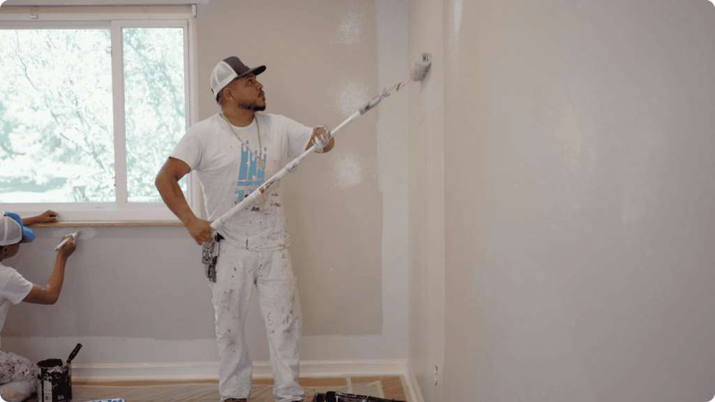 Painter in That 1 Painter Whites painting wall in a residential building in Delaware - painters in middletown