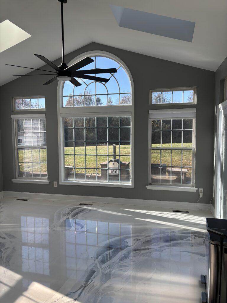 A clean living room that was freshly painted gray by That 1 Painter Middletown.