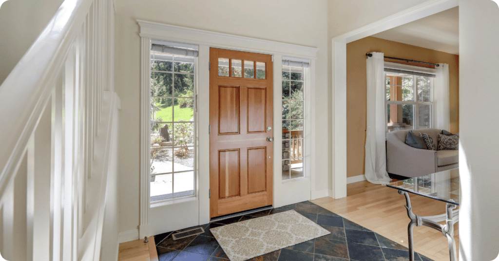 painters in luling paint the entry way of a home with stairs and front door that 1 painter