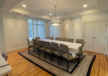An upscale dining room in North Atlanta painted white by That 1 Painter house painter in roswell