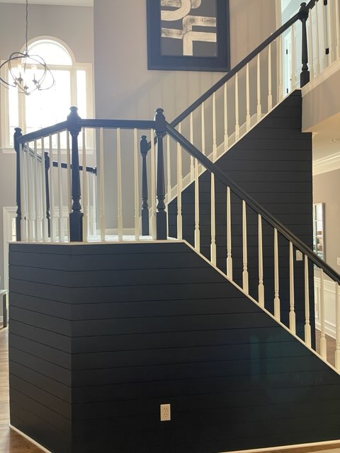 Black painted stairs in north atlanta painted by that 1 painter