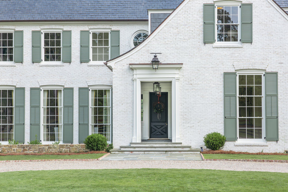 A white brick home that was just painted by That 1 Painter North Jersey
