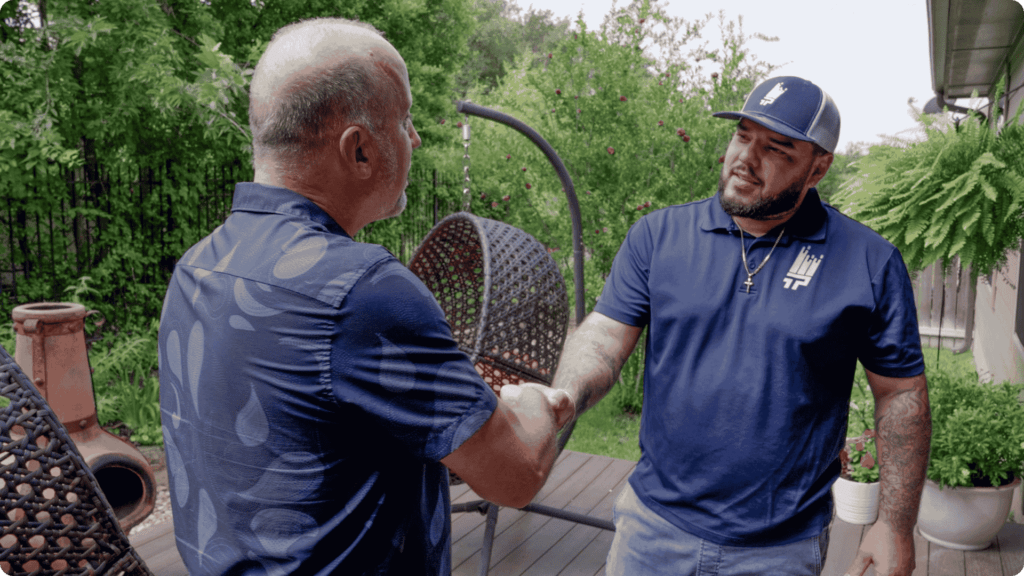 That 1 Painter North Jersey meeting a client before the start of a job that will include painting services.