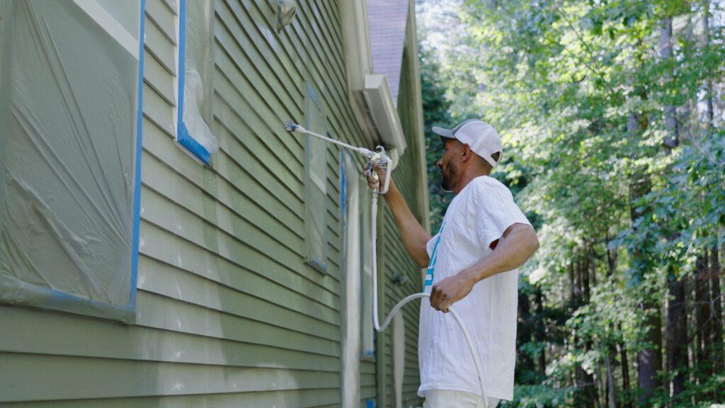 Painters in Park Ridge painting the exterior of a home with green paint - That 1 Painter North Jersey