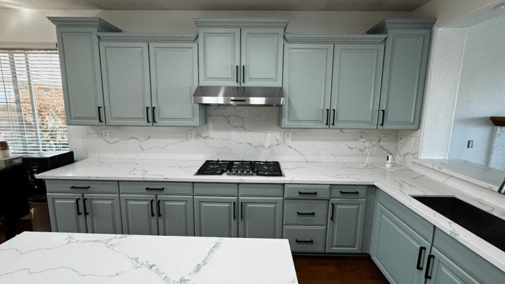 Cabinets that were painted turquoise by That 1 Painter Charleston
