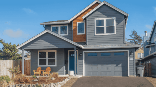 Gray exterior house painted with detailed craftsmanship by professional painters in Portland, Oregon.