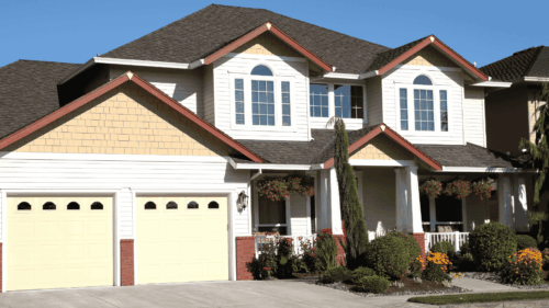 White exterior with brown trim house painted with detailed craftsmanship by professional painters in Happy Valley, Oregon