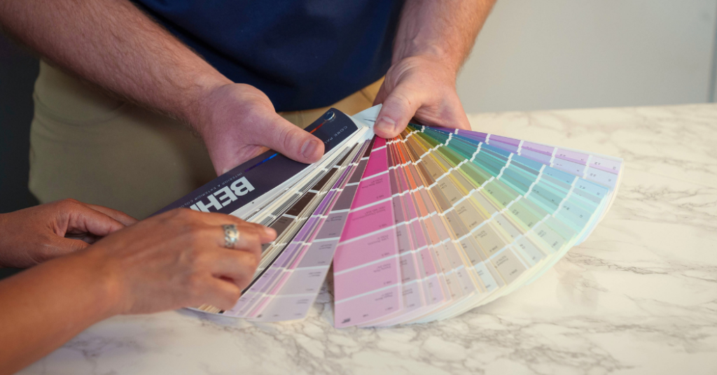 Client choosing the best paint colors for their Pearland home_that 1 painter