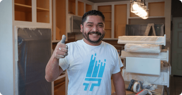 painter in rosharon holding up a thumbs up while completing a cabinet painting project_that 1 painter pearland