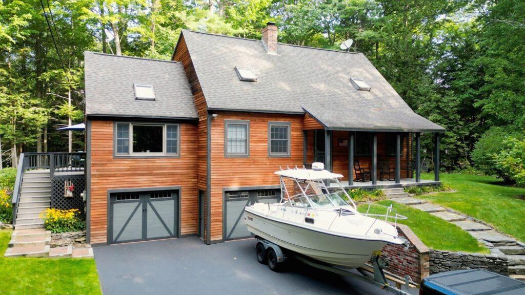big house with windows and boat in driveway with exterior work for high end home owners for that 1 painter salt lake city