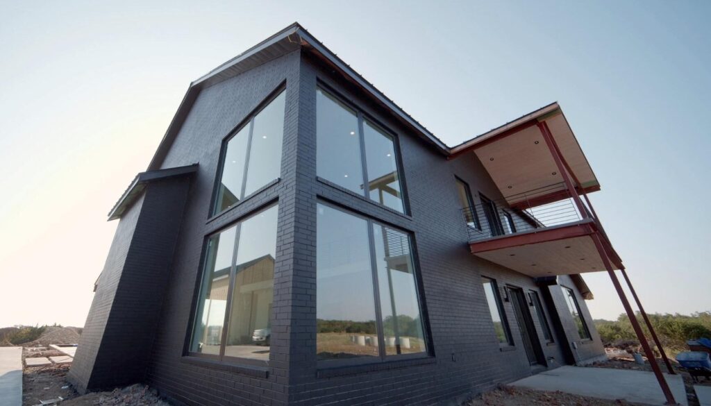 exterior black house with big windows_sugar house modern and stylish homeowners for that 1 painter salt lake city