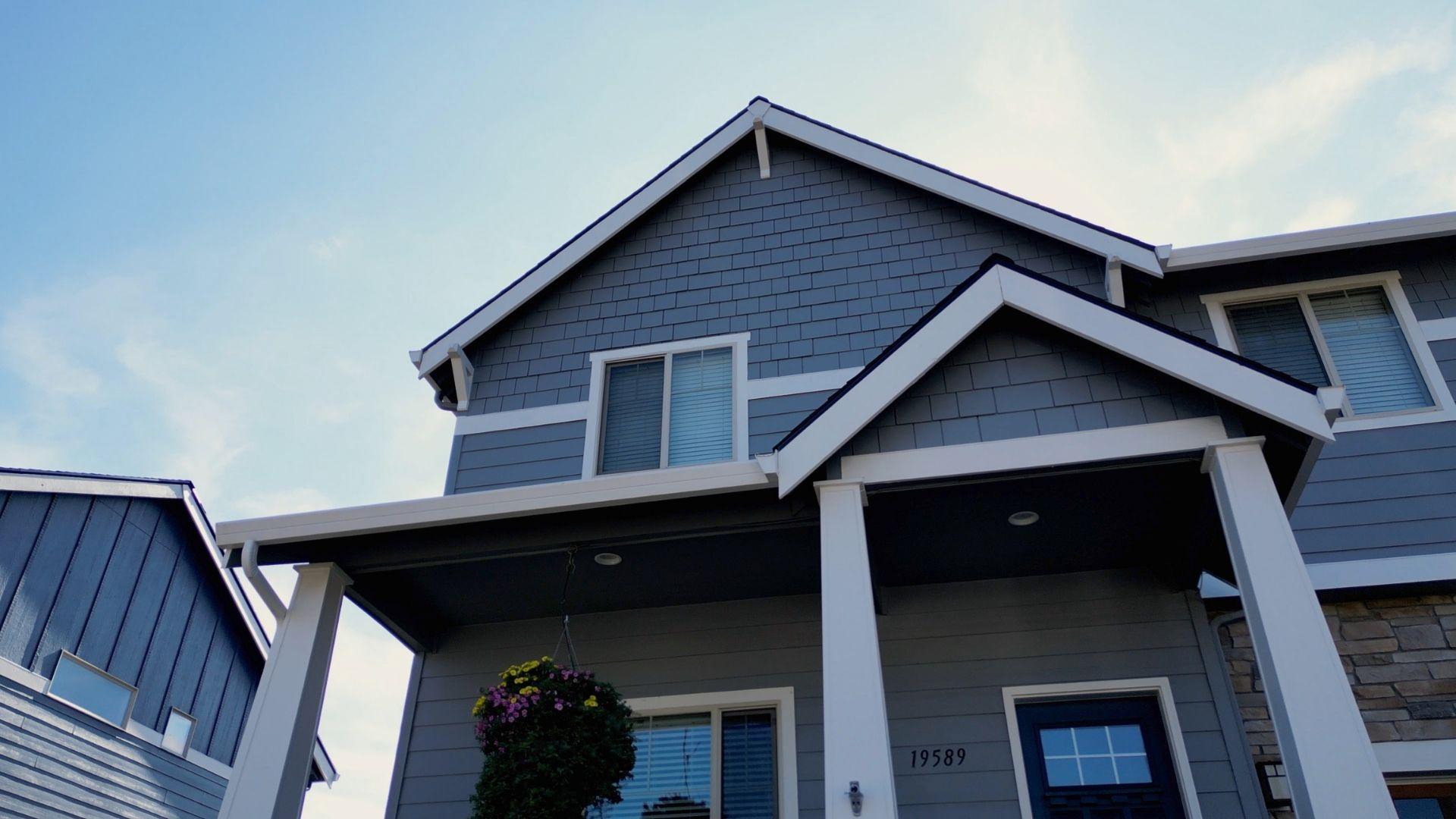 a gray home recently painted by professional painters in san marcos texas_that 1 painter