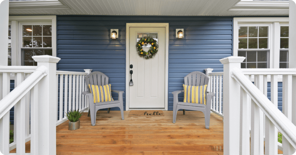 Professional Painters in Fruitville - Stained Deck - Blue house - Coastal Home