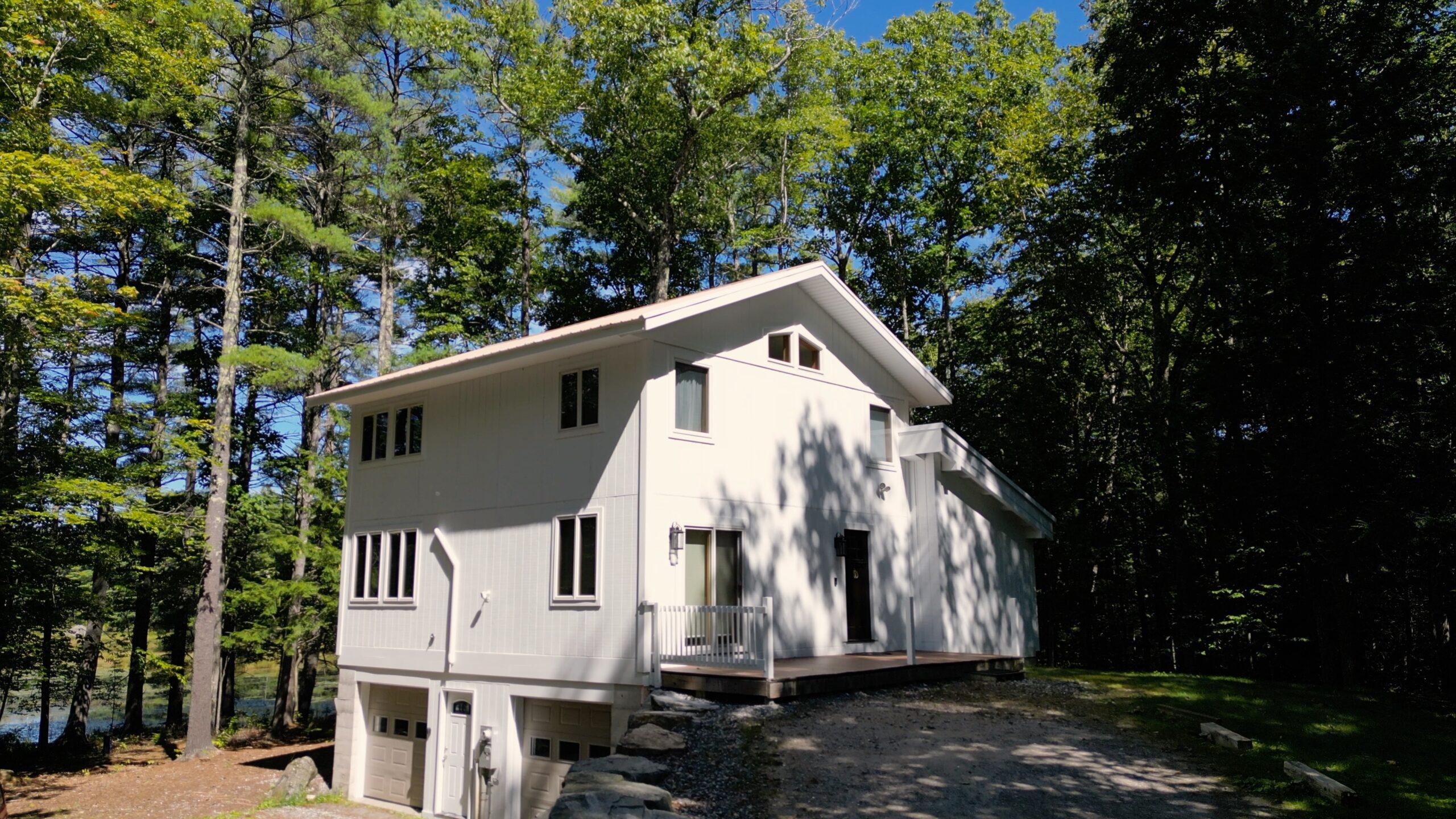 Exterior White House On Lake_Southern Maine_Painter Near Me