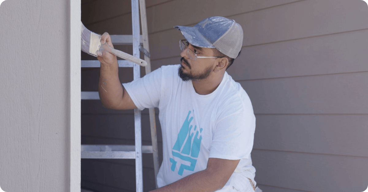 exterior painting being done with white trim for that 1 painter tampa bay