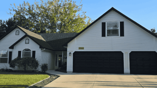 Beautiful white exterior house with dark trim painted by professional painters in Boise