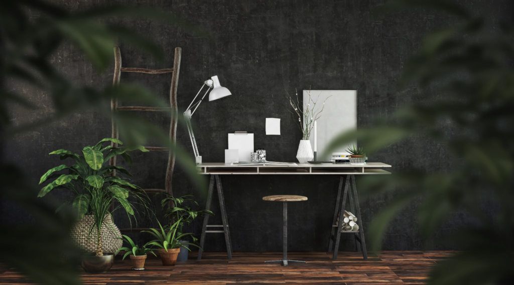 Photo of a bold black accent wall in an office by That 1 Painter.